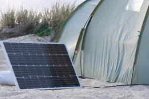 solar panel set up to power a tent for campers